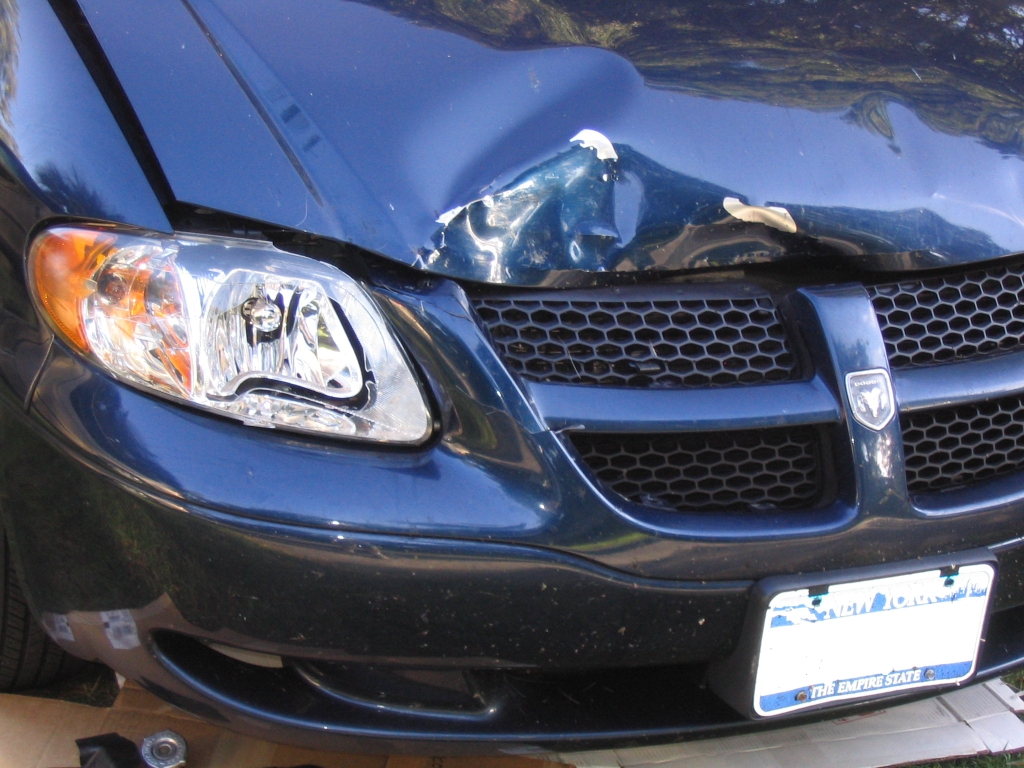 Our Car greatly damaged by an accident with a deer.